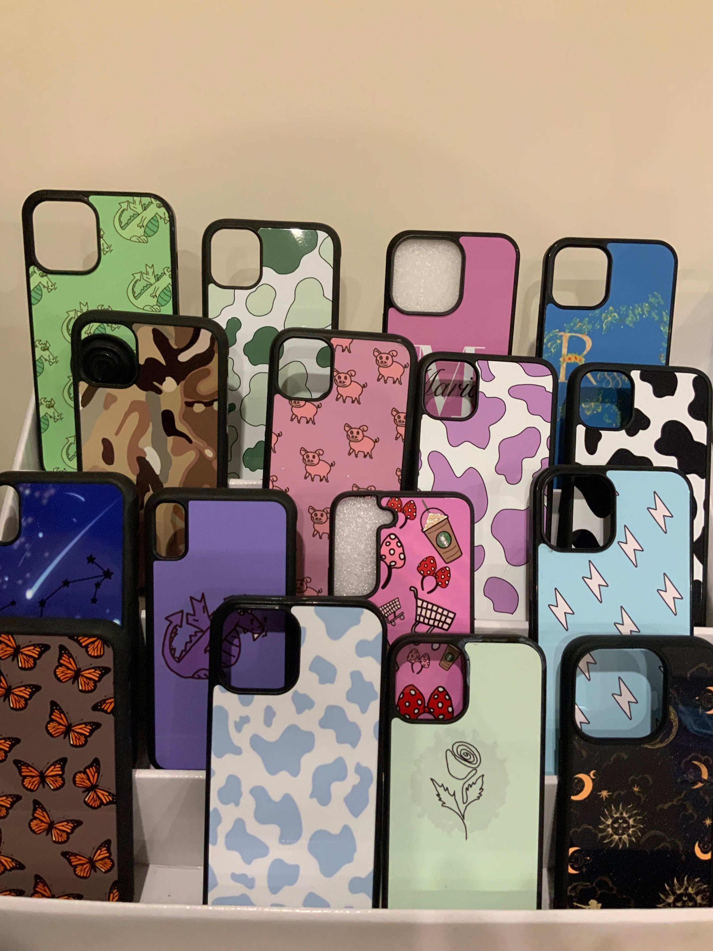 iphone cases with various patterns and images of animal print , floral and custom names